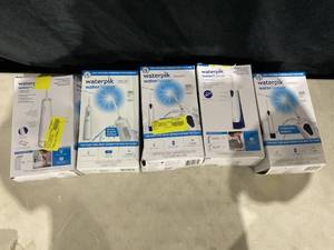 lot 422 image: LOT OF 5 Waterpik Cordless Water Flosser, Battery Operated & Portable for Travel & Home