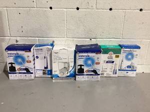 lot 575 image: LOT OF 6 Water Dental Floss
