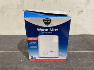 lot 202 image: Vicks 1 gallon Warm Mist Humidifier, 250 sq ft,  V750