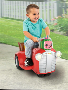 lot 460 image: Spark 6 Volt Cocomelon Interactive Tractor Ride-On