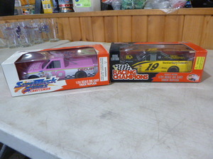 2 Racing Champions Die-Cast Trucks