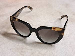 lot 69 image: Prada Milano Womens Polarized Sunglasses SPR14W (New )