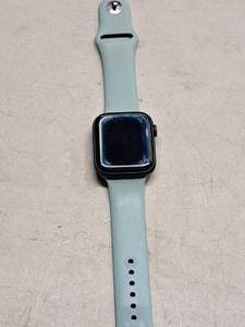 lot 87 image: Apple Watch Series 5 Nike Wrist Watch with Turquoise Band