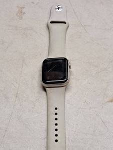 lot 91 image: Apple Watch SE Wrist Watch with White Band