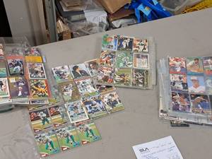 lot 151 image: Assorted BaseballFootballBasketball Collectors Cards in Plastic Sleeves