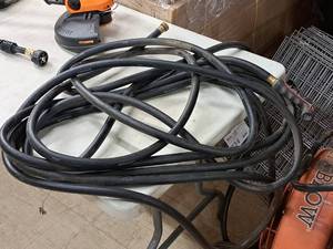 lot 252 image: Water Hose and Spray Gun Handle