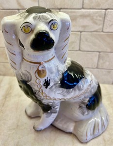 lot 56 image: Antique Black and White Staffordshire Spaniel