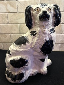 lot 92 image: Vintage Hand Painted Black and White English Staffordshire Spaniel Dog Figurine