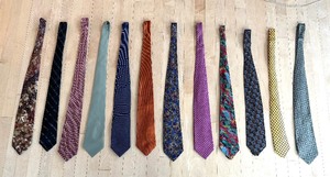 lot 219 image: Twelve Neckties by Burberry, Valentino, Visconti, Brioni and More