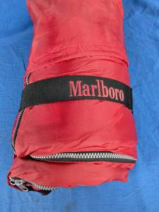 lot 20 image: Vintage Marlboro Adventure Team Sleeping Bag with Plaid Lining
