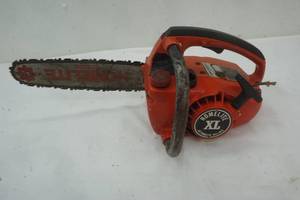 lot 140 image: Homelite Textron chainsaw. Working condition unknown