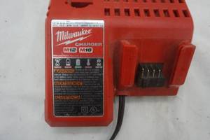 lot 159 image: Milwaukee charging block and Lion battery