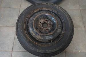lot 174 image: spare tire and half cover. Goodyear. T14590D16. 5 bolt pattern.