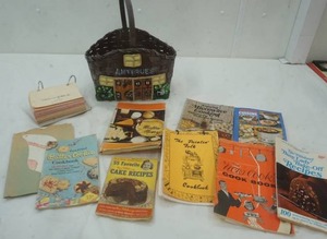 lot 212 image: Vintage Cookbook Recipe basket variety of small cookbooks and recipes on cards