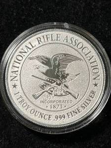 lot 08 image: 1 TROY OZ .999 FINE SILVER NATIONAL RIFLE ASSOCIATION IN AIRTITE
