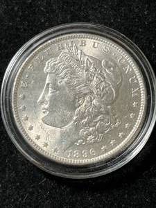 lot 09 image: 1896 US MORGAN SILVER DOLLAR UNC IN AIRTITE