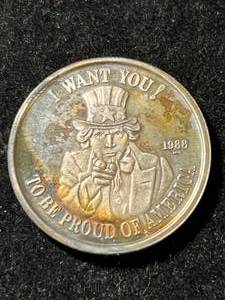 lot 63 image: 1 TROY OZ .999 FINE SILVER PROUD AMERICAN ROUND