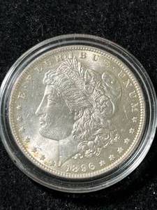 lot 87 image: 1896 US MORGAN SILVER DOLLAR BU IN AIRTITE