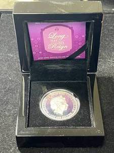 lot 112 image: 1 TROY OZ .999 FINE SILVER 2020 QUEEN ELIZABETH LONG MAY SHE REIGN