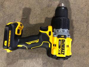 lot 42 image: DEWALT 20V Compact Cordless 12 in. Hammer Drill (Tool Only)  Customer Returns See Pictures