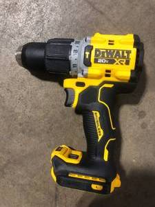 lot 1 image: DEWALT 20V Compact Cordless 12 in. Hammer Drill (Tool Only) Customer Returns See Pictures
