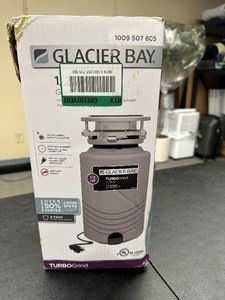 lot 62 image: Glacier Bay 12Hp Garbage Disposal With Turbo Grind