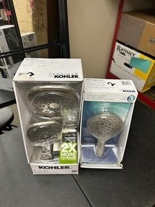 lot 271 image: 2 Kohler Magnetic Shower Heads - 1 Kohler Adjuse & 1 Kohler Prossecco - Open Box Like New