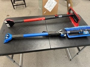 lot 426 image: 2 Large Extenable Snow Sweepers  Ice Scrapers For Cars  Trucks - One New One Used A Little