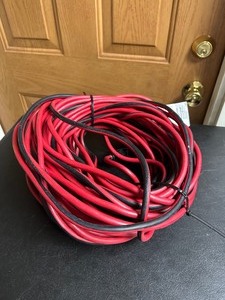 lot 477 image: 100 Ft 14 Guage Husky Heavy Duty Extension  Power Cord