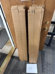 lot 497 image: 21 Uline Shipping Boxes 48 x 4 x 4