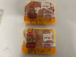 A. 2pkgs Boneless Skinless Chicken Thighs-Photo Shows Avg Wgt will not be exact