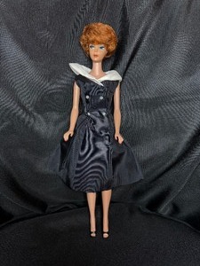 lot 22 image: RED HEAD BUBBLE CUT BARBIE GINGER WITH OUTFIT
