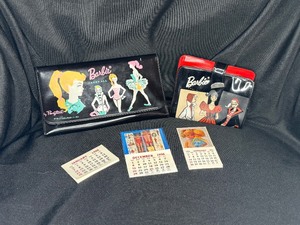 lot 33 image: TWO VINTAGE PLASTIC BARBIE COIN PURSES