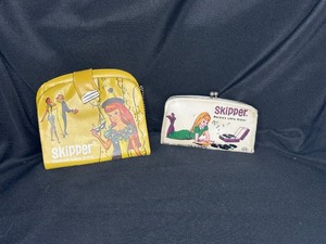 lot 34 image: TWO VINTAGE SKIPPER COIN PURSES
