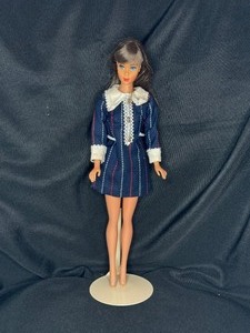 lot 37 image: VINTAGE DARK BRUNETTE MOD BARBIE IN NAVY BLUE MINI DRESS FOR JAPANESE MARKET