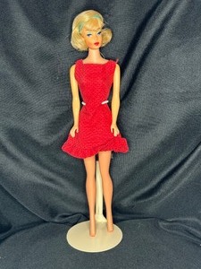 lot 38 image: VINTAGE AMERICAN GIRL BLONDE BARBIE WITH DRESS AND STAND