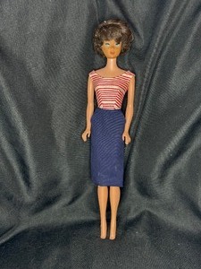 lot 42 image: VINTAGE BRUNETTE BUBBLECUT BARBIE WITH CRUISE OUTFIT