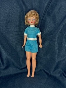 lot 56 image: VINTAGE TAMMY DOLL WITH ORIGINAL BLUE ROMPER OUTFIT