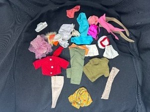 lot 65 image: LOT OF DOLL CLOTHING WITH KEN SHIRT