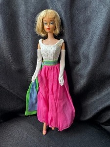 lot 112 image: VINTAGE 1958 BARBIE WITH DRESS - BENDABLE LEGS