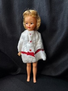 lot 117 image: VINTAGE PEPPER DOLL WITH WHITE AND RED COAT