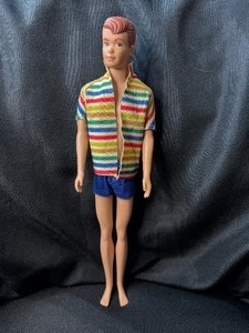 lot 135 image: VINTAGE MOLDED HAIR ALLAN DOLL WITH SWIM OUTFIT