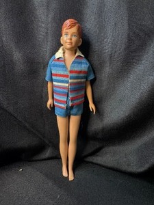 lot 137 image: VINTAGE RICKY DOLL WEARING SWIMSUIT OUTFIT