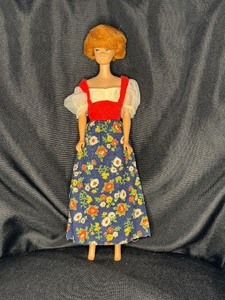lot 169 image: VITNAGE RED HEAD BUBBLE CUT BARBIE WITH OUTFIT