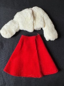 lot 173 image: BARBIE WHITE PLUSH COAT WITH TAG AND RED SKIRT