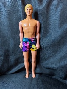 lot 227 image: KEN BARBIE WITH SWIMSUIT