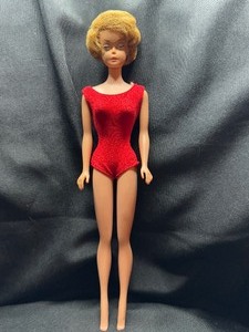 lot 233 image: VINTAGE BUBBLE CUT BARBIE WITH SWIMSUIT