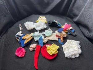 lot 263 image: MIXED LOT OF DOLL CLOTHING ITEMS