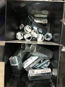 lot 12 image: BIN WITH ASSORTED COUPLINGS