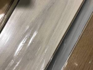 lot 79 image: CREASED IVORY FLOORING